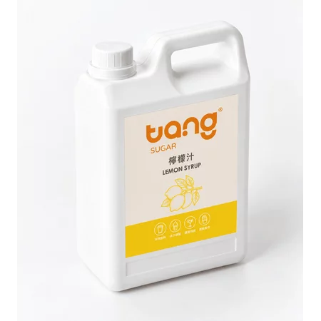 업소용 용기에 담긴 Tang Sugar 레몬 시럽